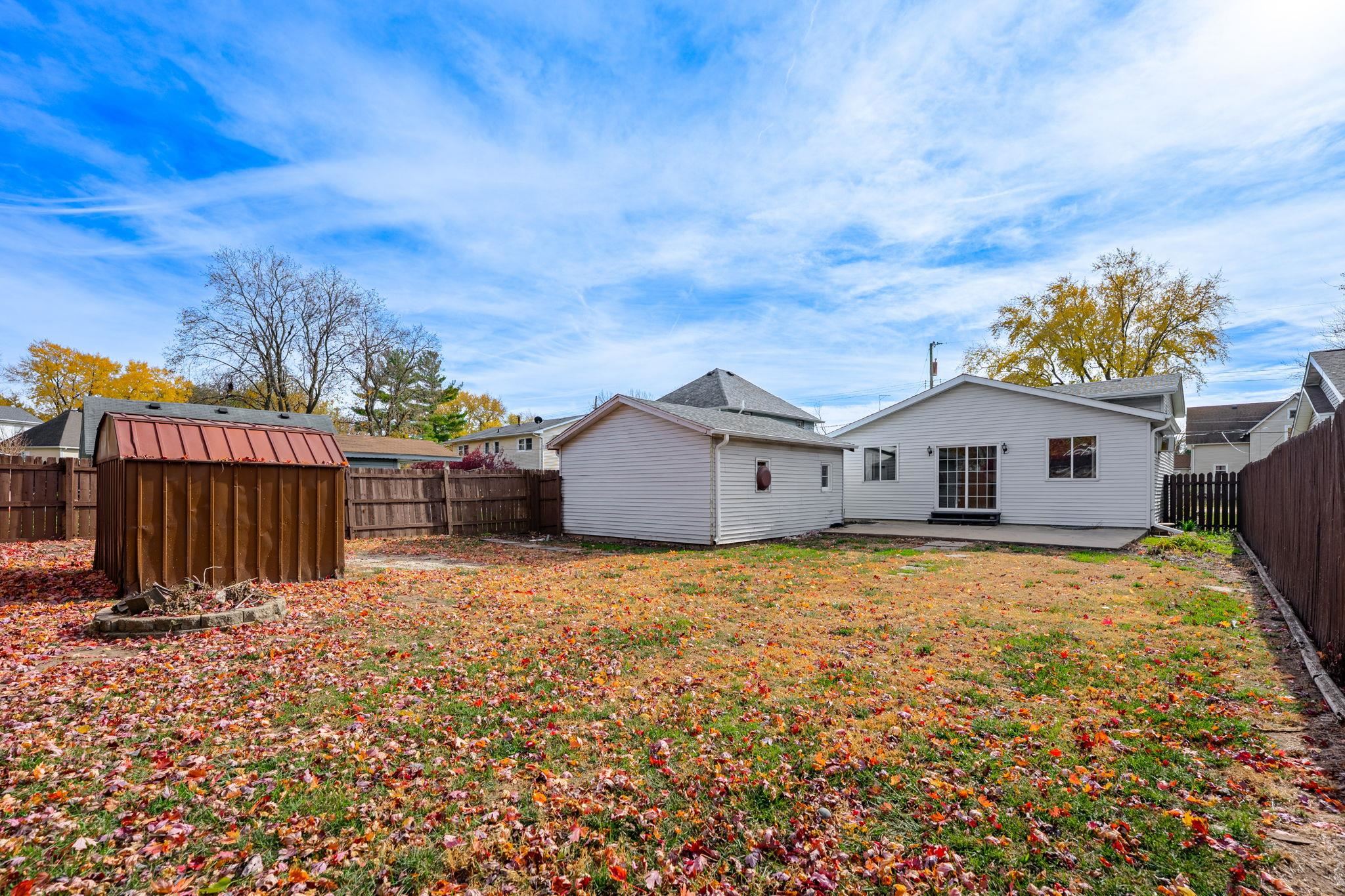 729 West Perry Street Belvidere, IL 61008 - Photo 26 of 27 a house view with a garden space