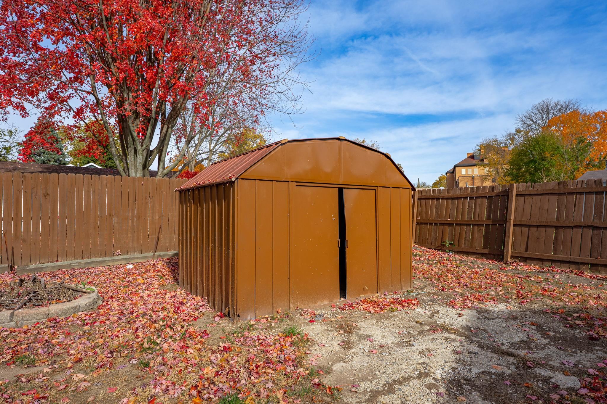 729 West Perry Street Belvidere, IL 61008 - Photo 27 of 27 a view of backyard with wooden fence