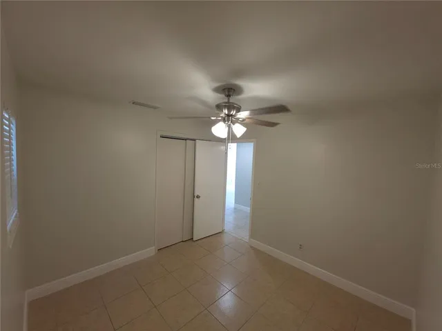 a view of a chandelier fan and a chandelier fan