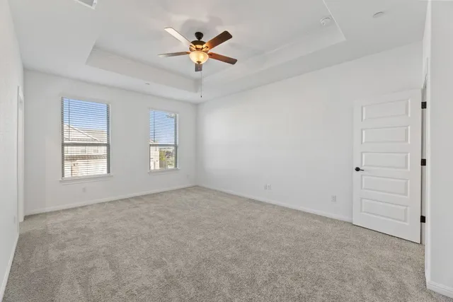 a bathroom with a bathtub and a toilet