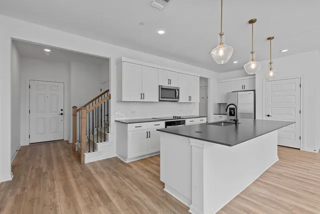 a view of room with hardwood floor