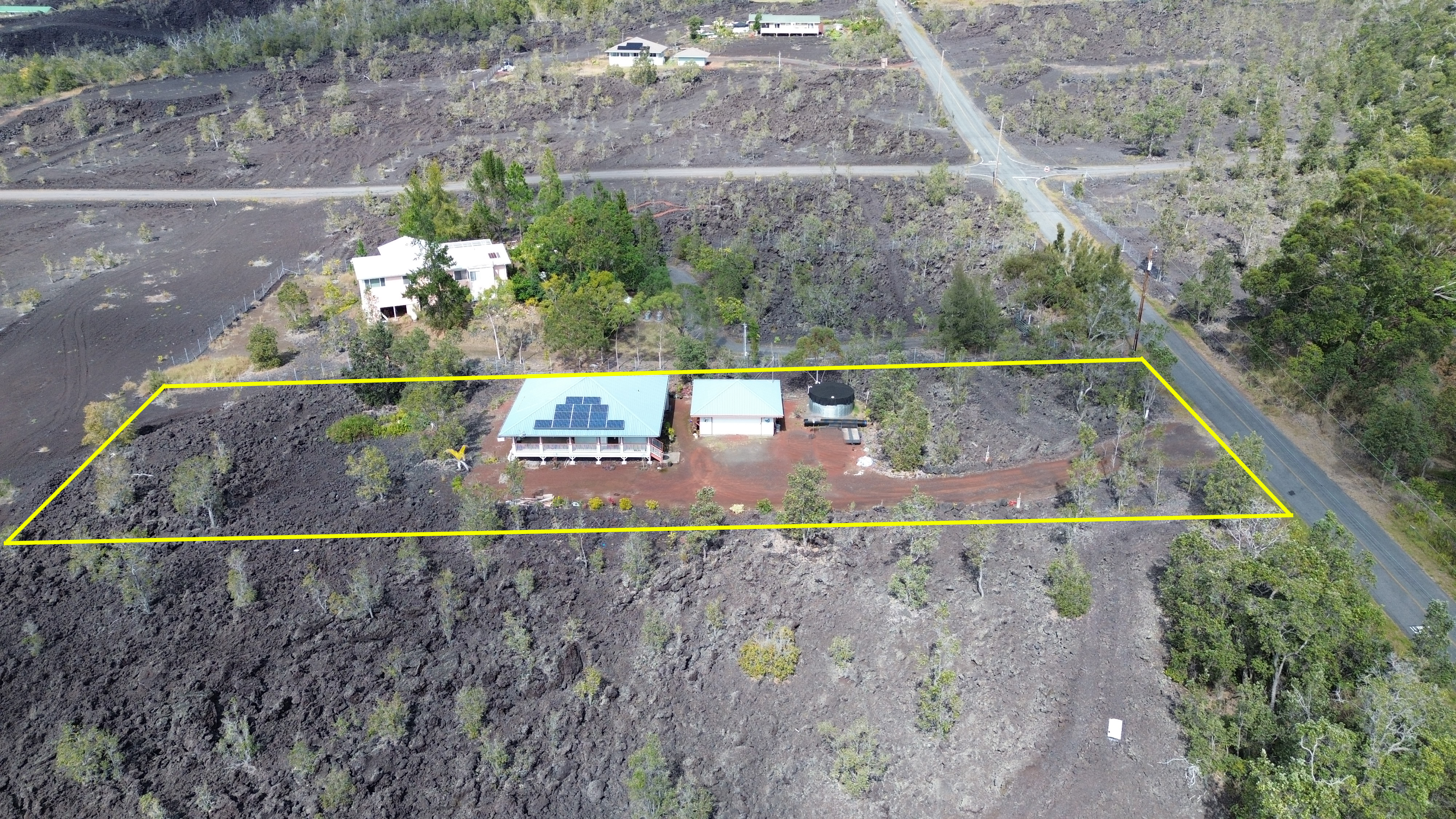 92-8901 Tiki Lane Ocean View, HI 96704 - Photo 7 of 24 a view of swimming pool with a yard
