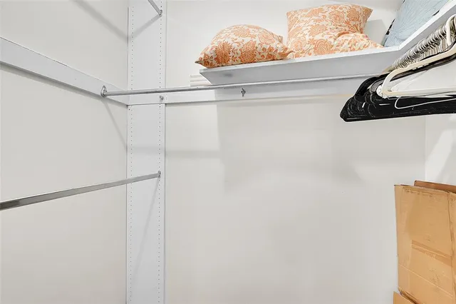 a bathroom with a shower and a sink