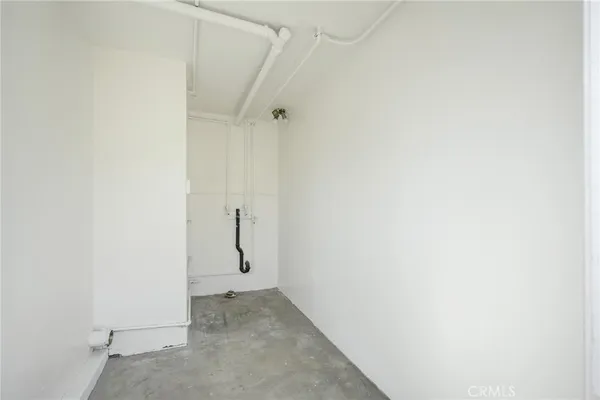 a view of a house with a tree