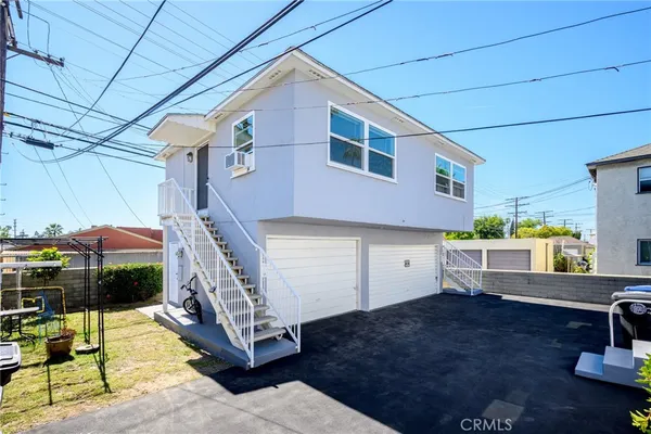 a house view with a backyard space