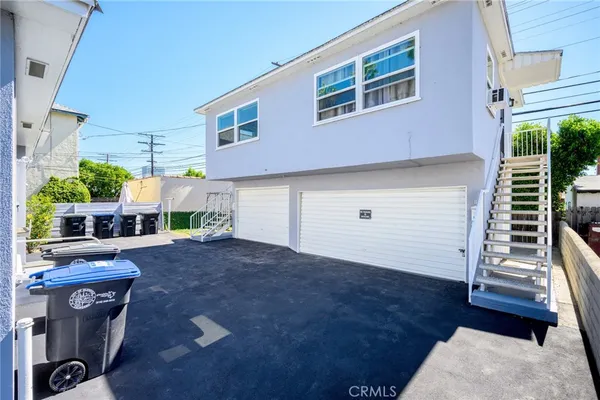 a view of a house with furniture and porch