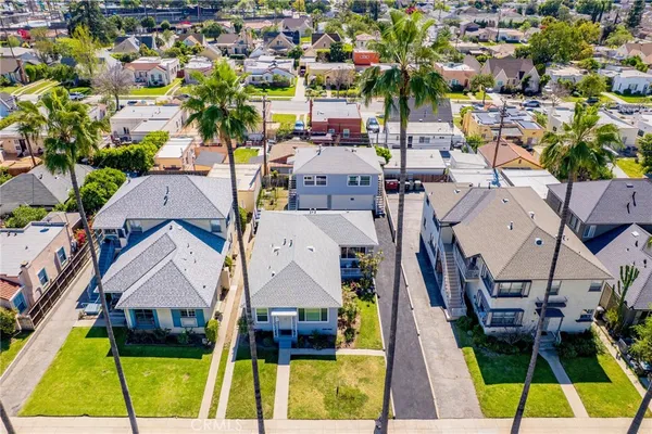 an aerial view of a house with a swimming pool