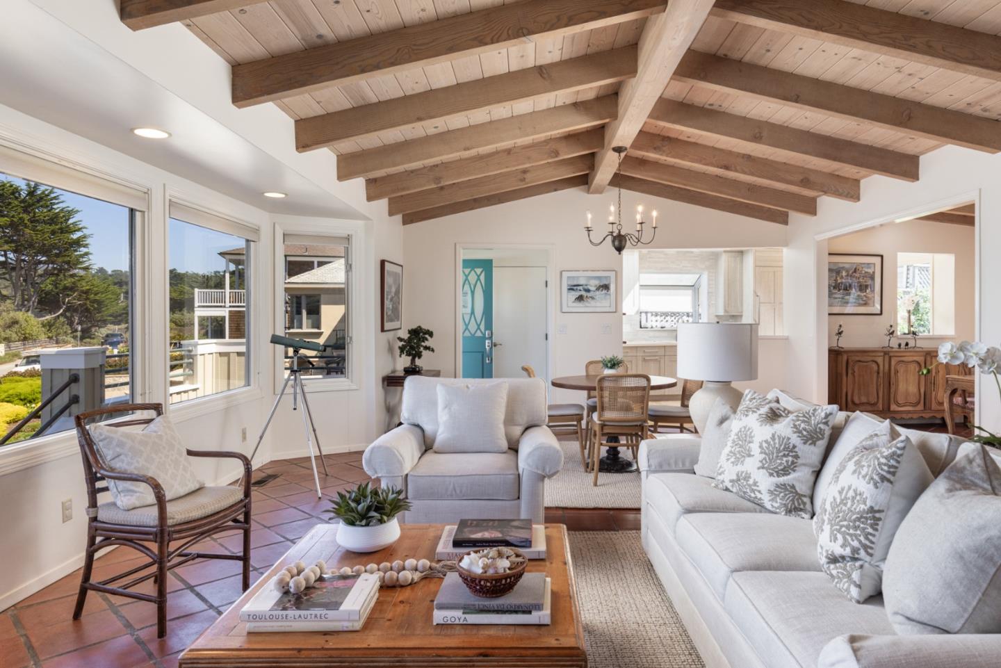 26177 Scenic Road Carmel, CA 93923 - Photo 5 of 30 a living room with furniture and a chandelier