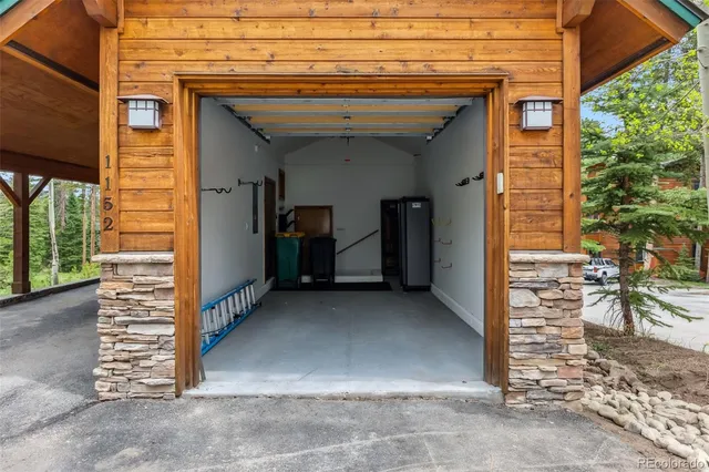 a view of a wooden house with a large window