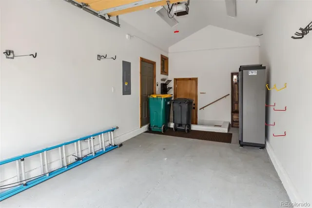 a view of an empty room with stairs