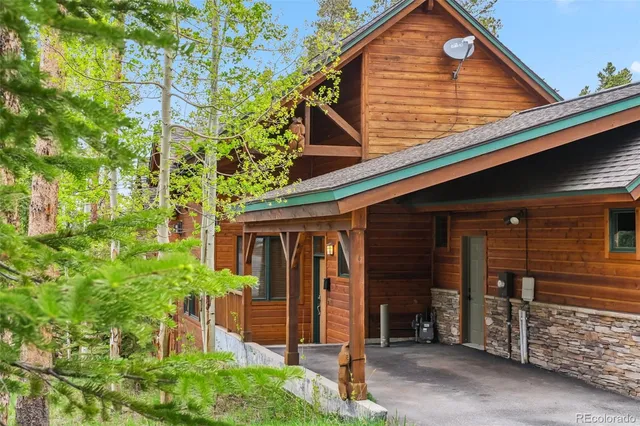 a view of a house with brick walls and windows