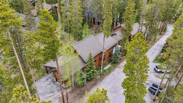 an aerial view of a house with a garden