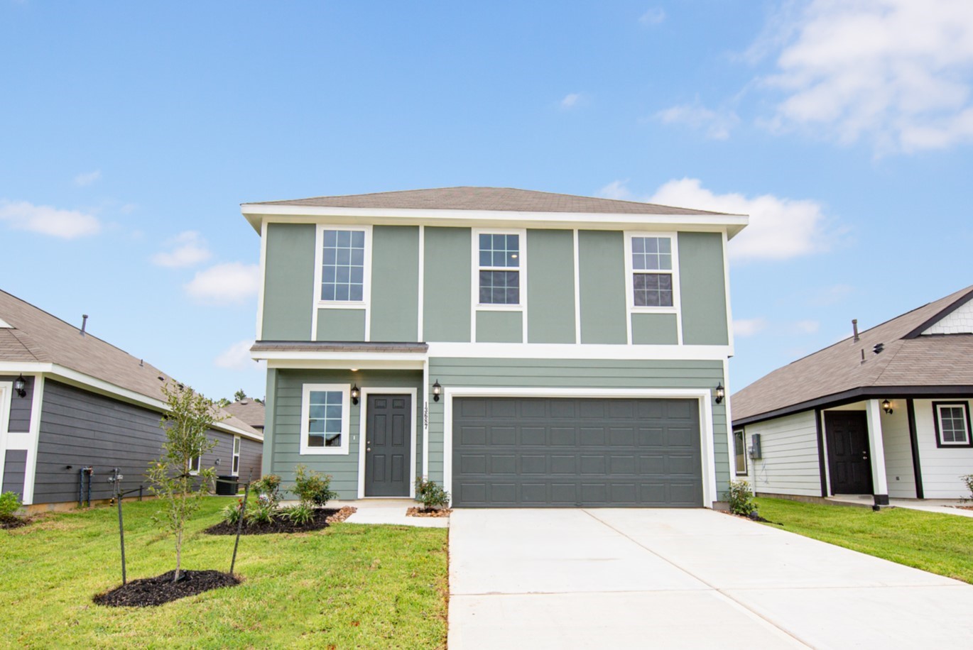 13687 Kit Run Splendora, TX 77372 - Photo 2 of 24 a front view of house with yard