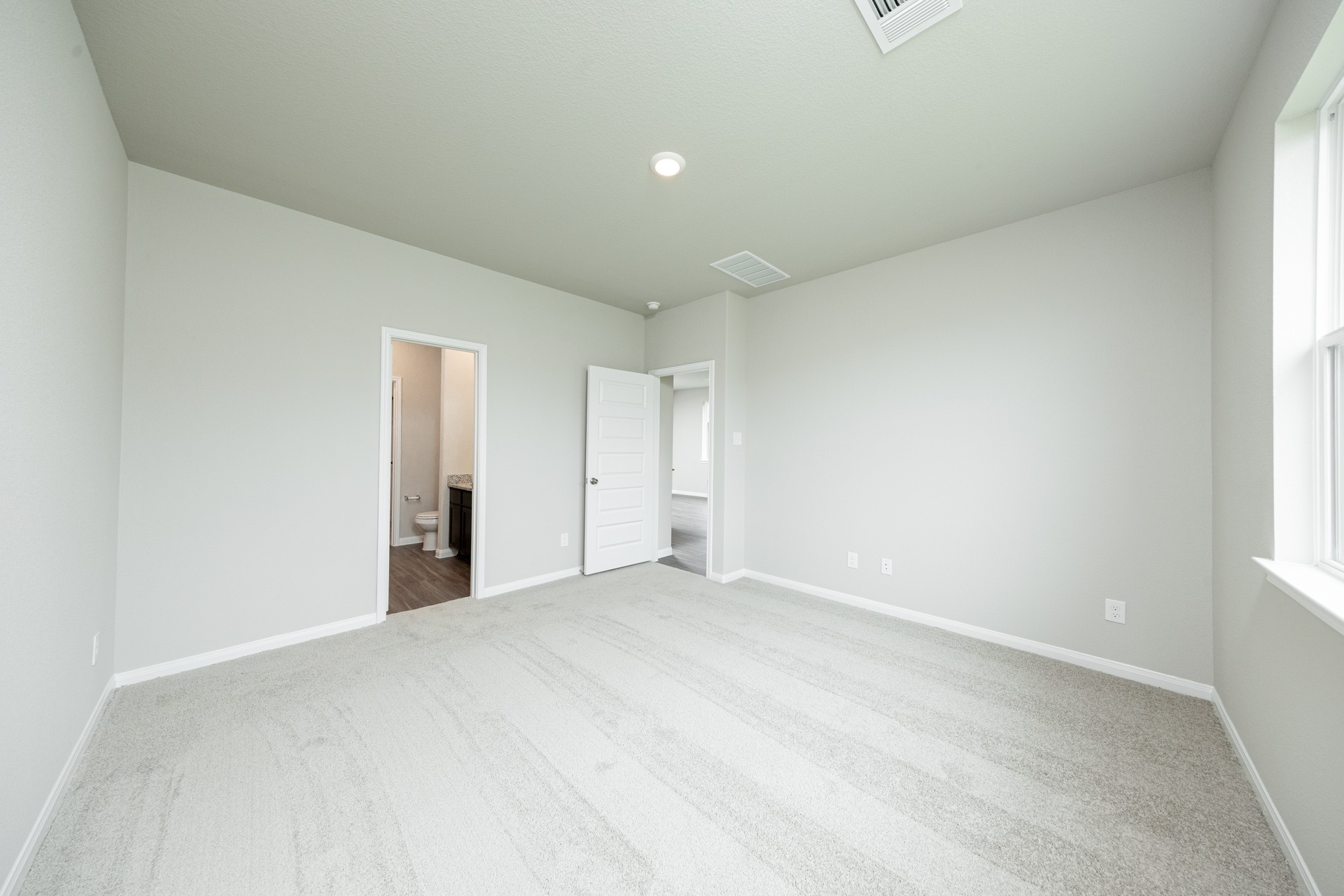 13687 Kit Run Splendora, TX 77372 - Photo 10 of 24 a view of an empty room with a window