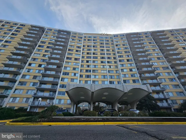 a view of swimming pool with outdoor seating