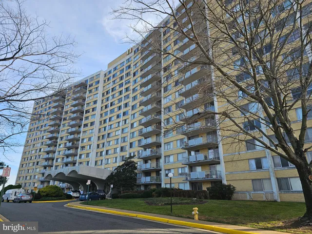 a bathroom with a toilet and a tub