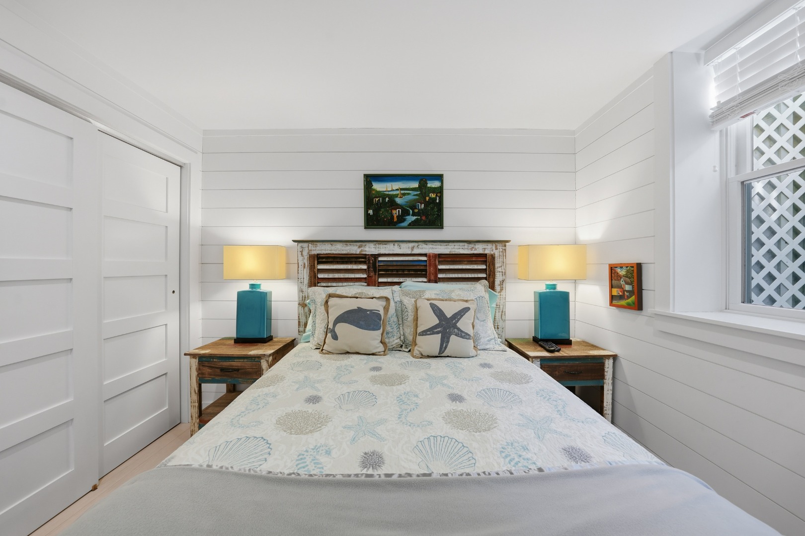 10 Pilgrim Road Nantucket, MA 02554 - Photo 51 of 65 a bedroom with a bed and window