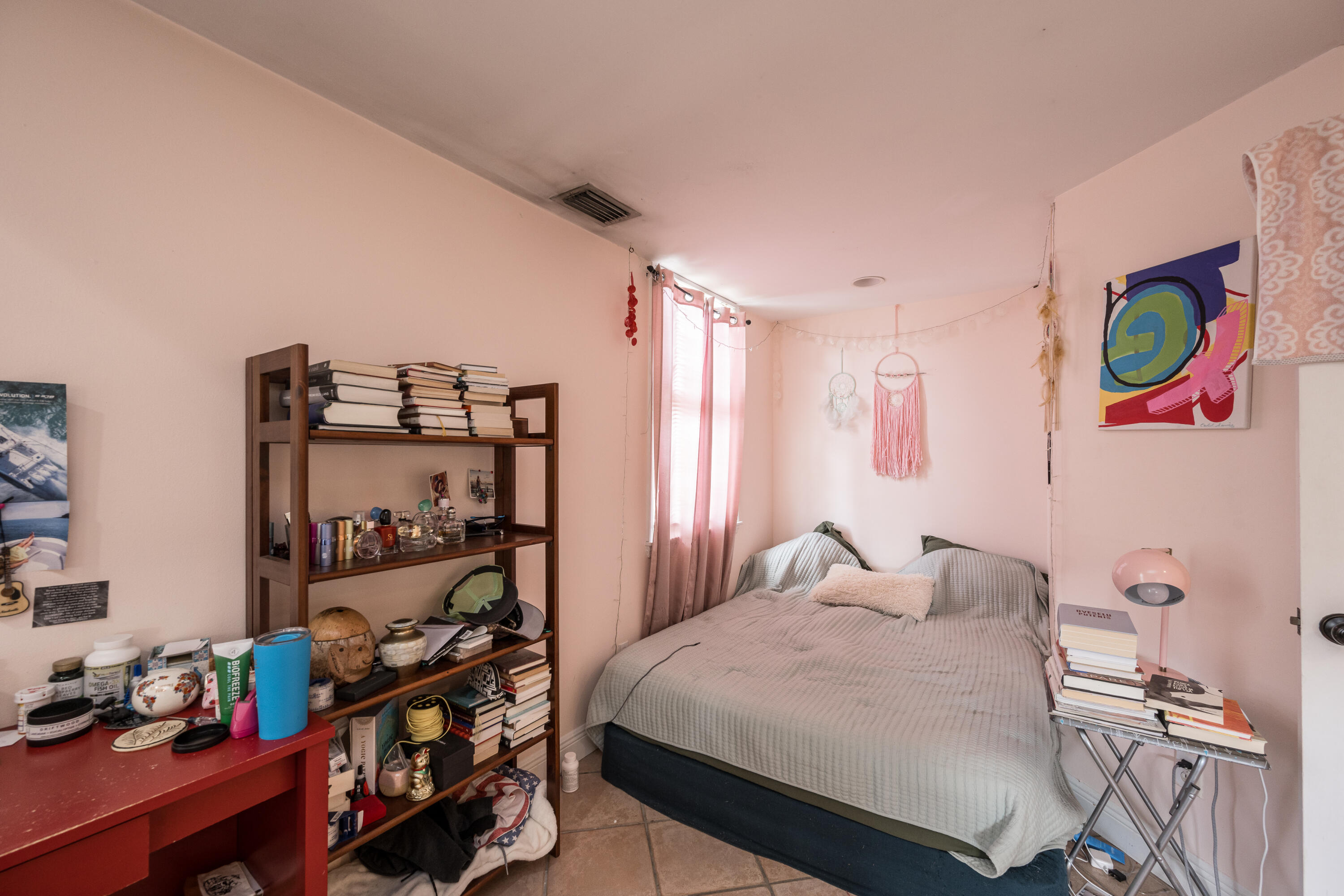 405 Petronia Street Key West, FL 33040 - Photo 17 of 47 a bedroom with a bed and a window