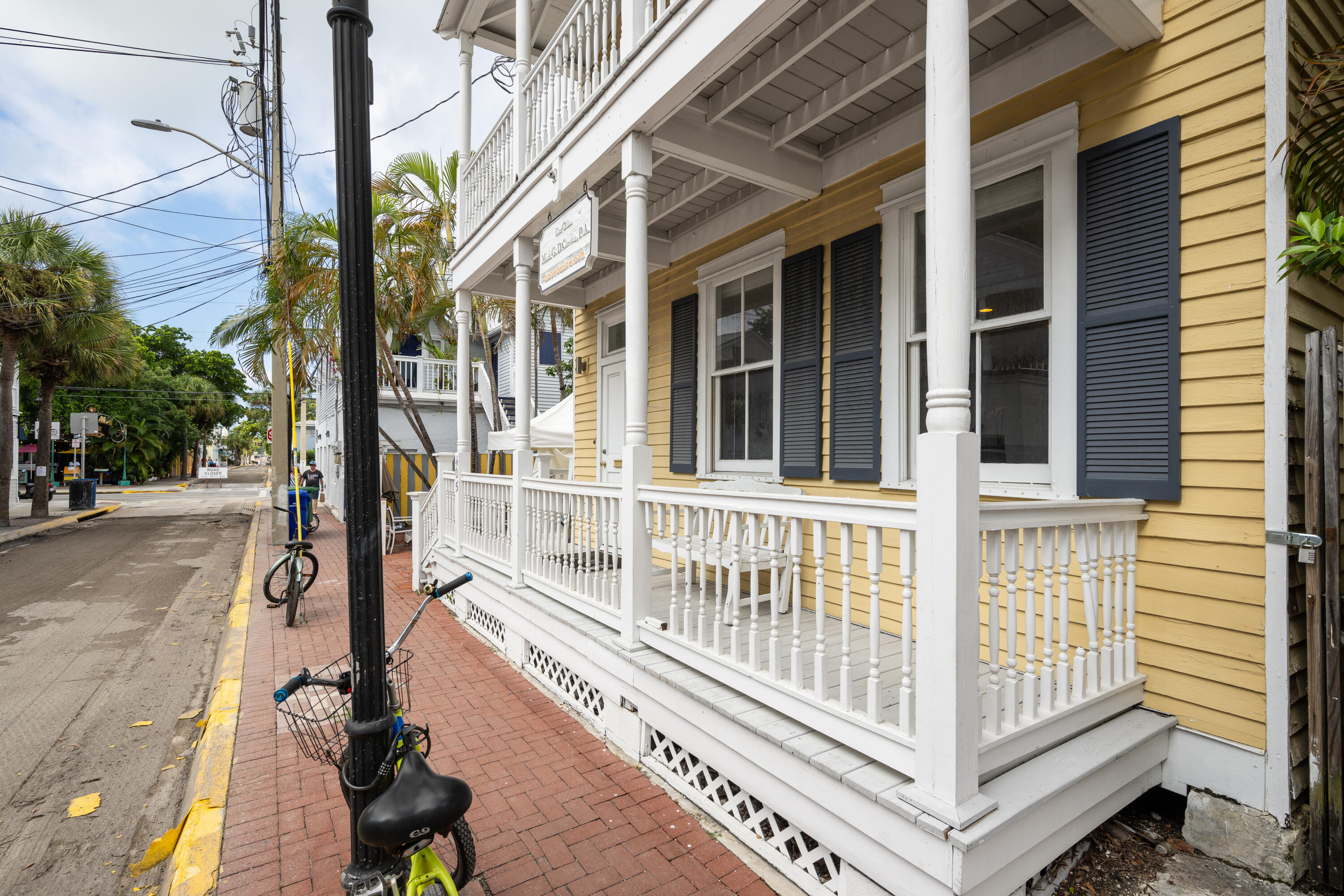 405 Petronia Street Key West, FL 33040 - Photo 4 of 47 a view of a street with a large window