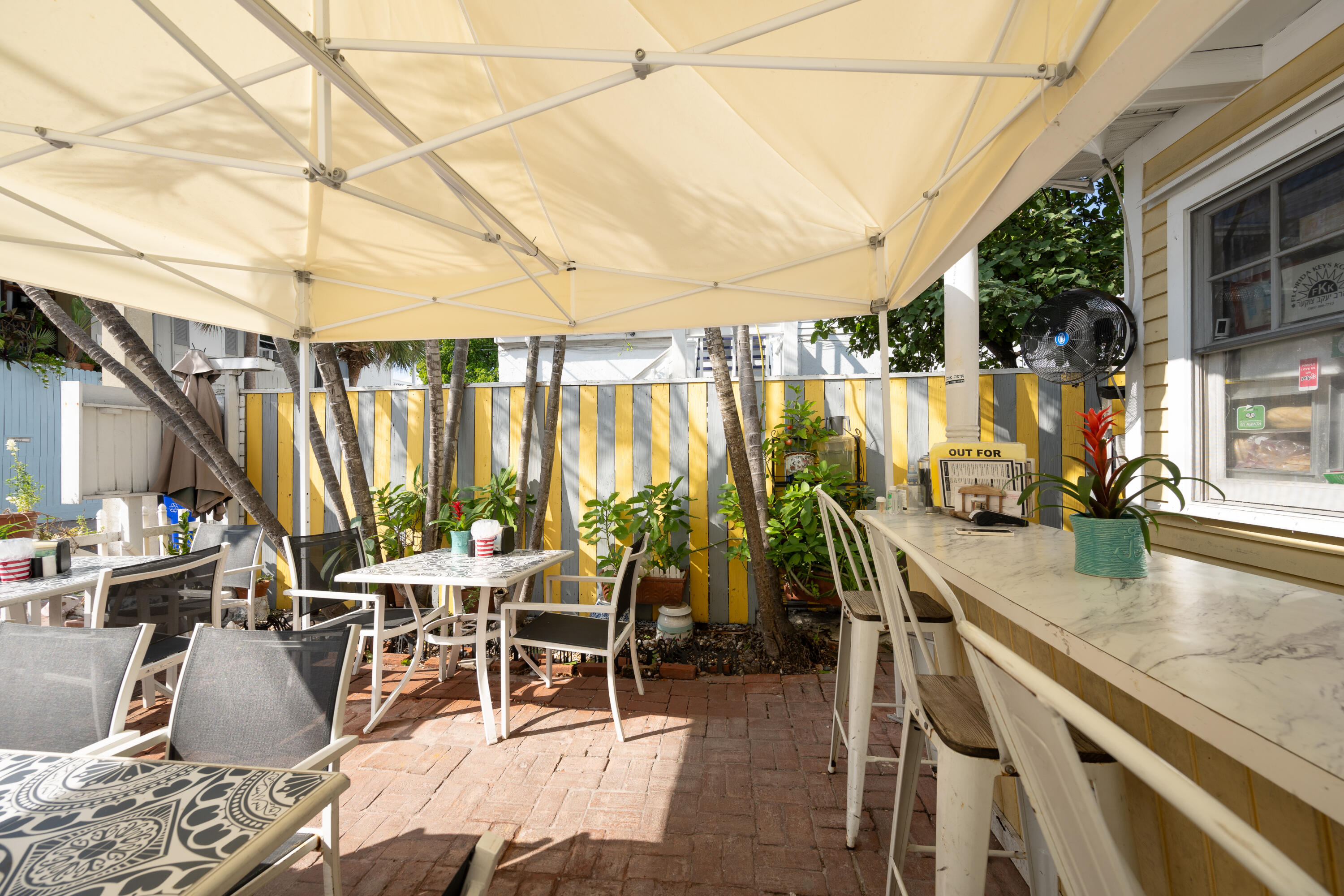 405 Petronia Street Key West, FL 33040 - Photo 46 of 47 an outdoor space with seating