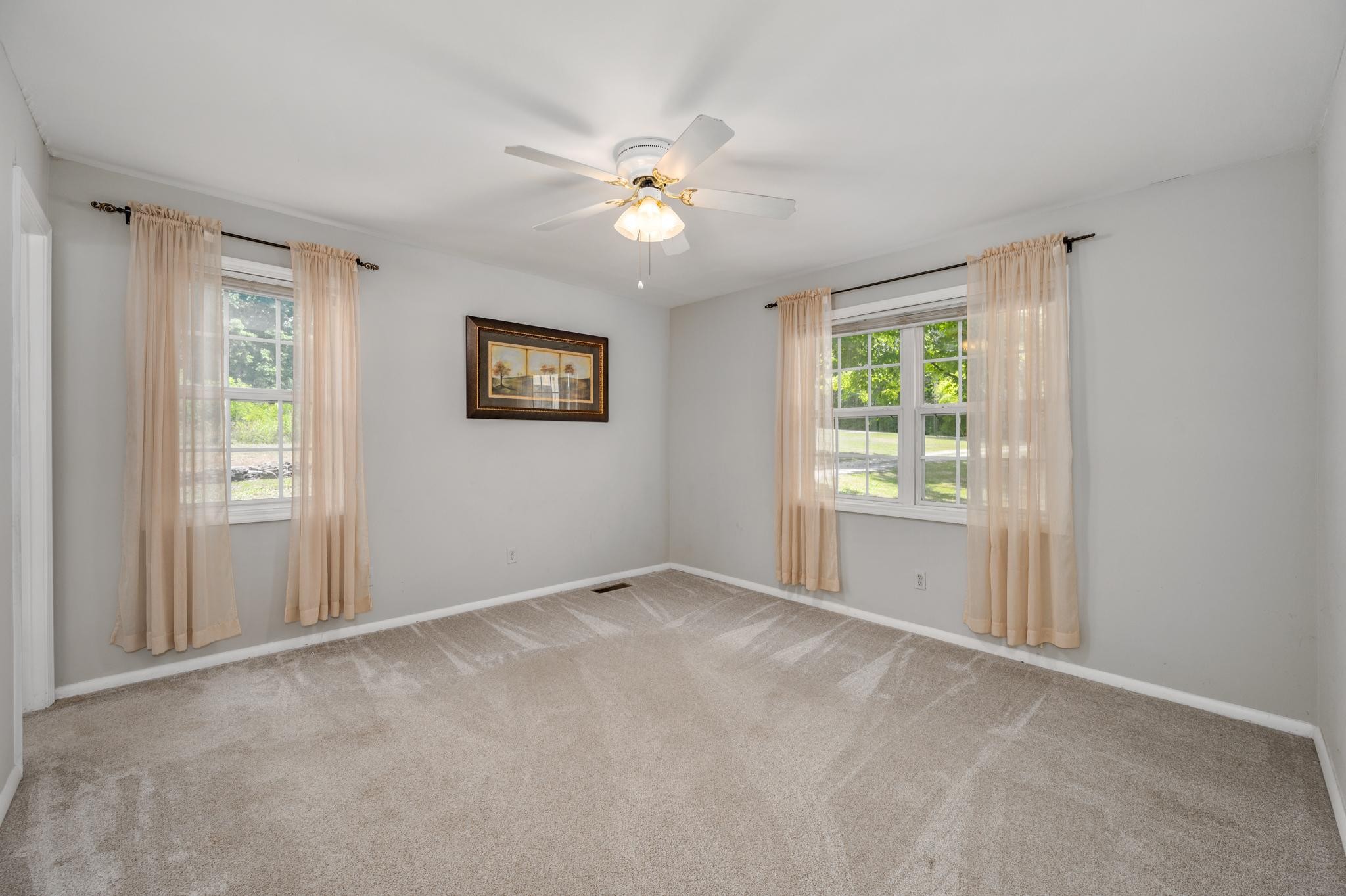 5799 Cane Ridge Road Antioch, TN 37013 - Photo 13 of 45 a view of an empty room with a window