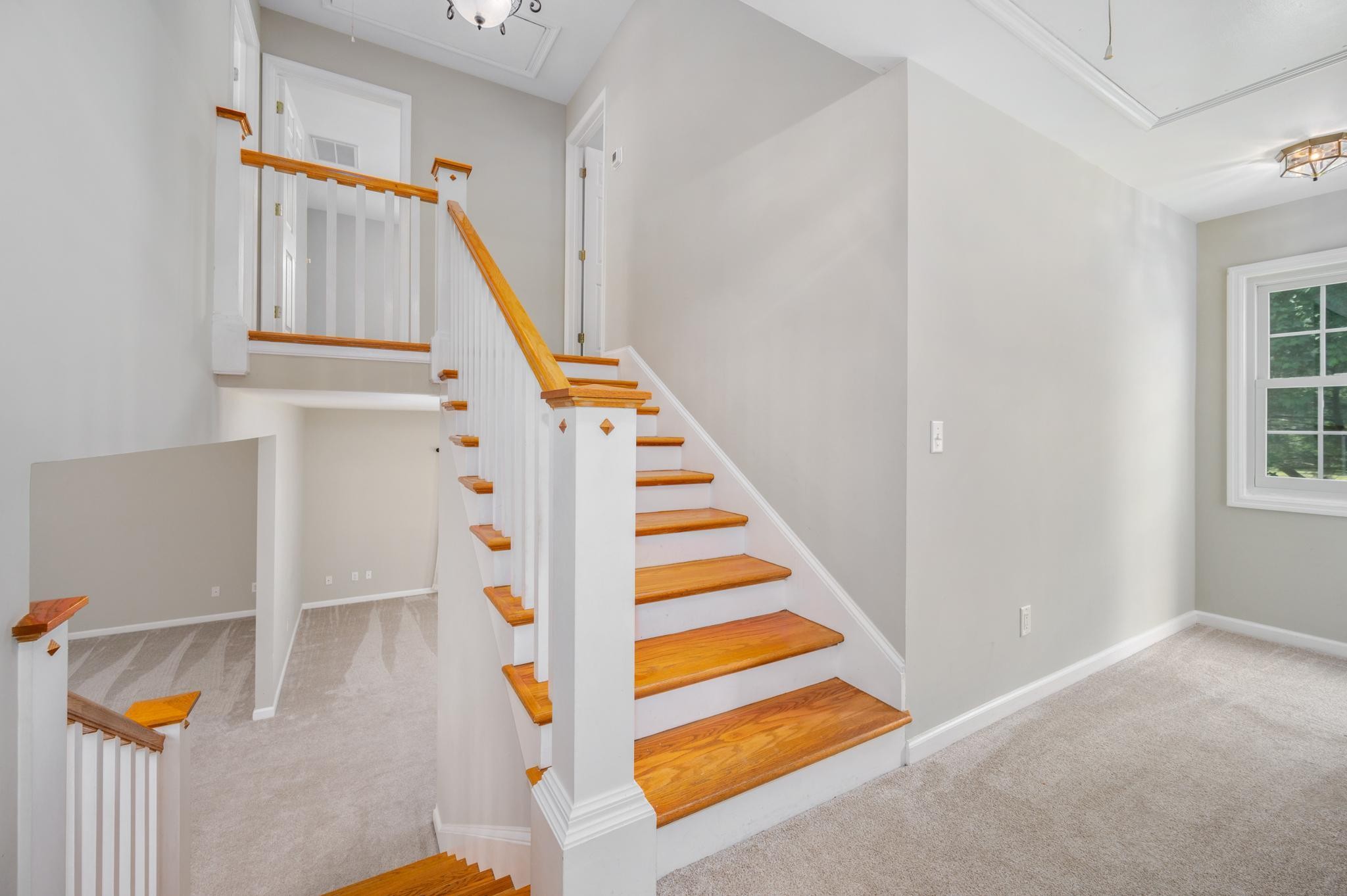 5799 Cane Ridge Road Antioch, TN 37013 - Photo 18 of 45 a view of staircase with white walls and a window