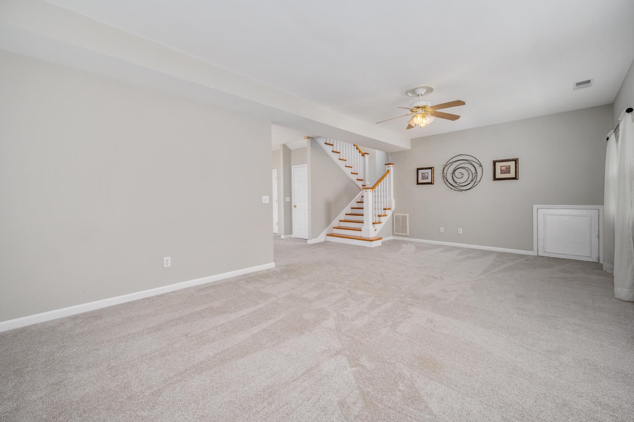 5799 Cane Ridge Road Antioch, TN 37013 - Photo 19 of 45 a view of room with stairs and a window