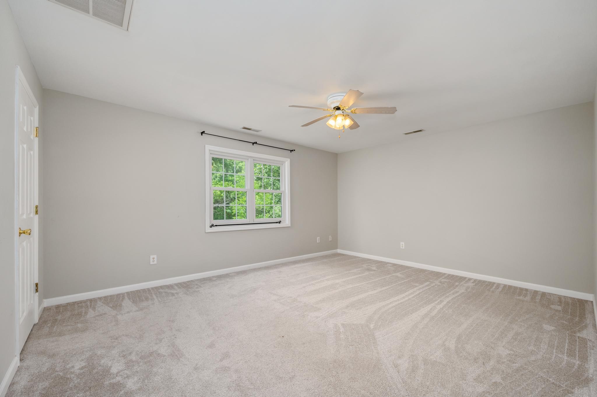 5799 Cane Ridge Road Antioch, TN 37013 - Photo 22 of 45 an empty room with a window