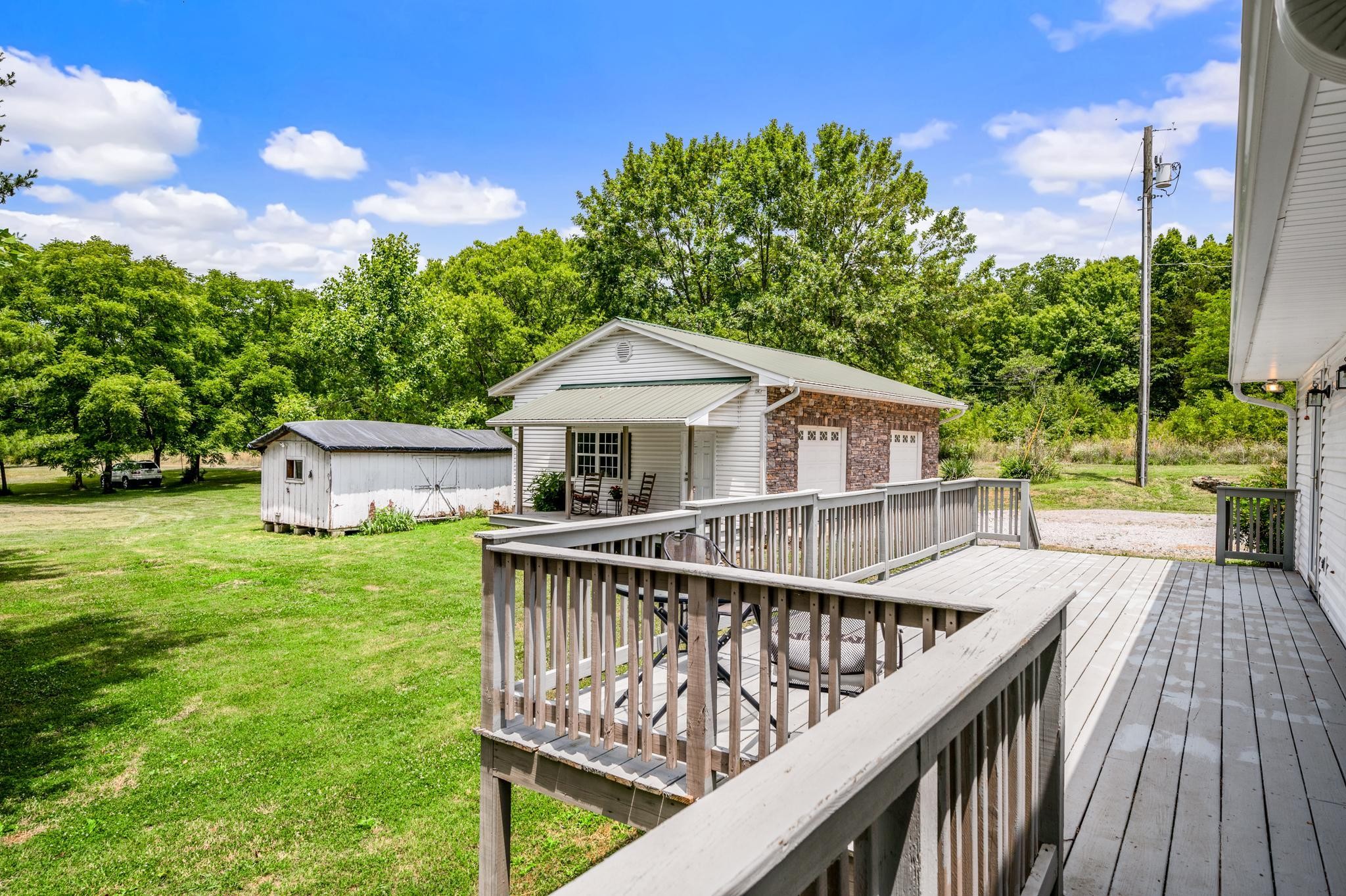 5799 Cane Ridge Road Antioch, TN 37013 - Photo 25 of 45 a view of house with backyard and trees