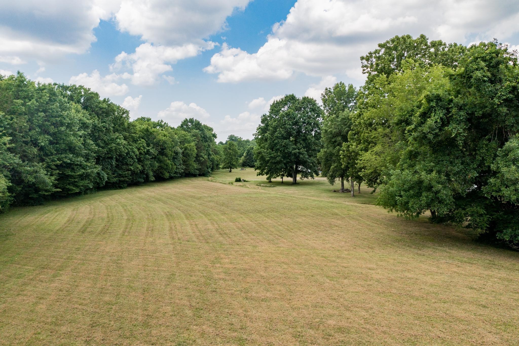 5799 Cane Ridge Road Antioch, TN 37013 - Photo 28 of 45 a view of a field with an trees