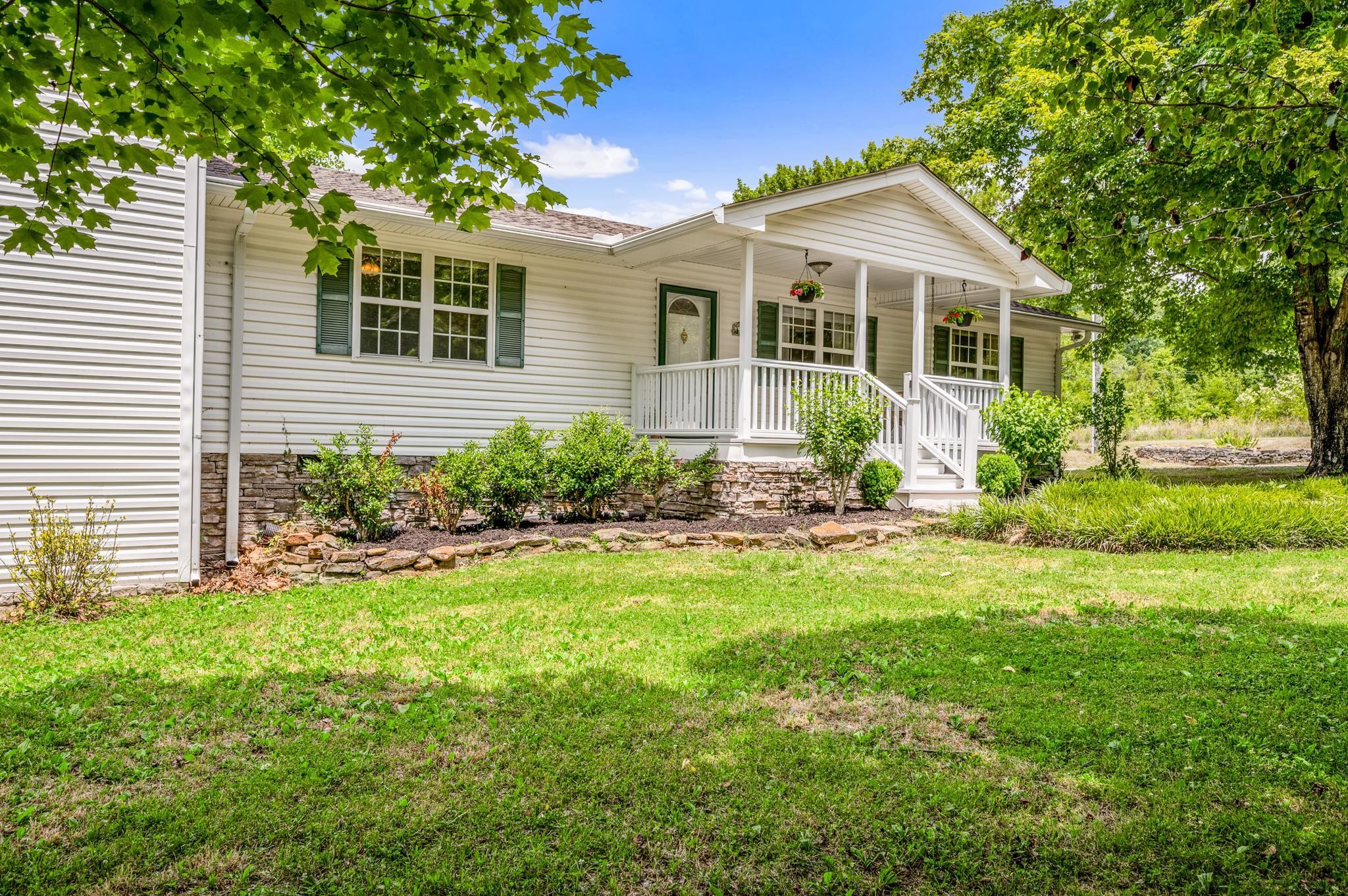 5799 Cane Ridge Road Antioch, TN 37013 - Photo 33 of 45 a front view of a house with a yard and porch