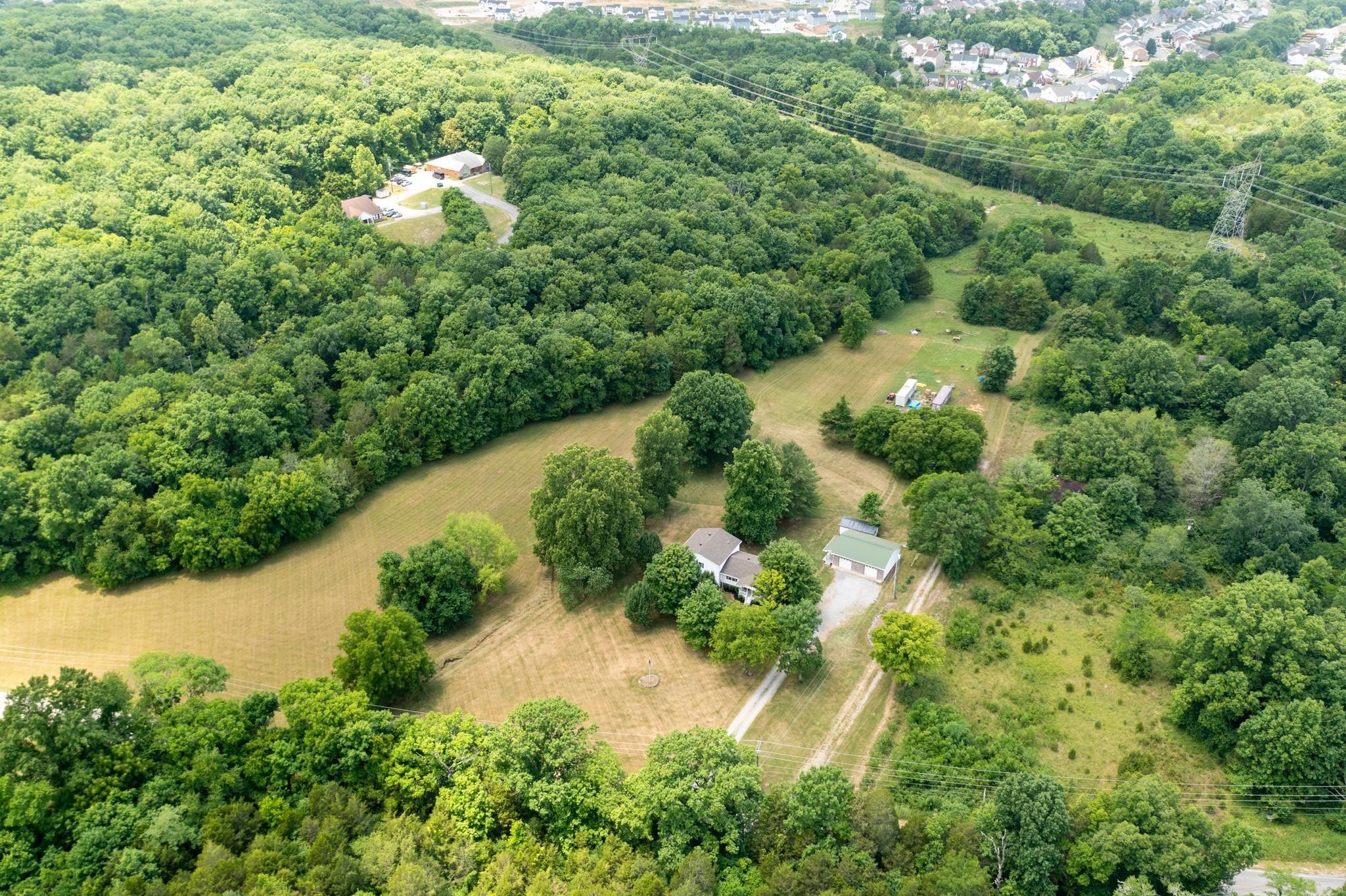 5799 Cane Ridge Road Antioch, TN 37013 - Photo 36 of 45 an aerial view of residential house with outdoor space and trees all around
