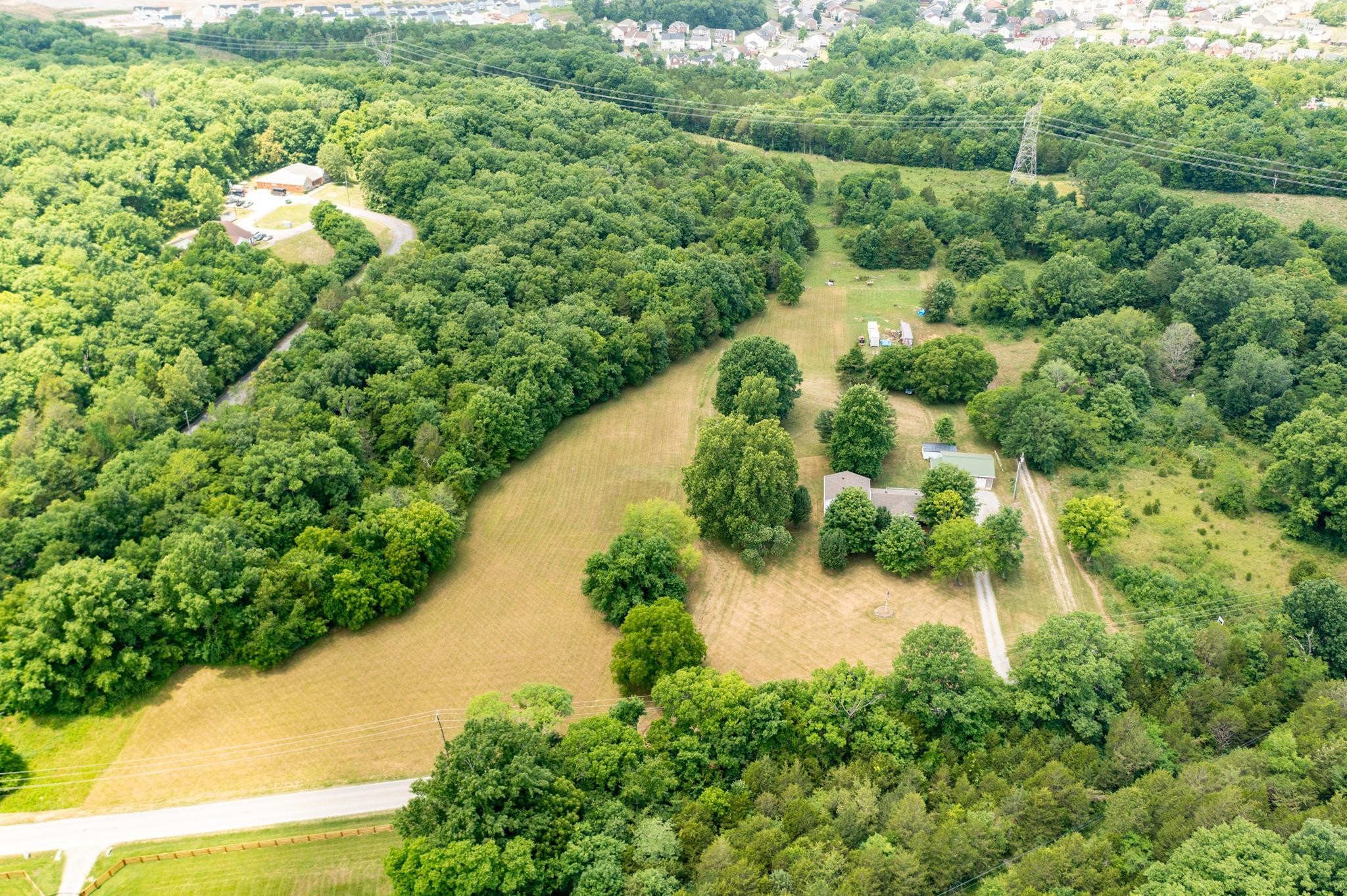 5799 Cane Ridge Road Antioch, TN 37013 - Photo 37 of 45 an aerial view of residential houses with outdoor space and trees all around