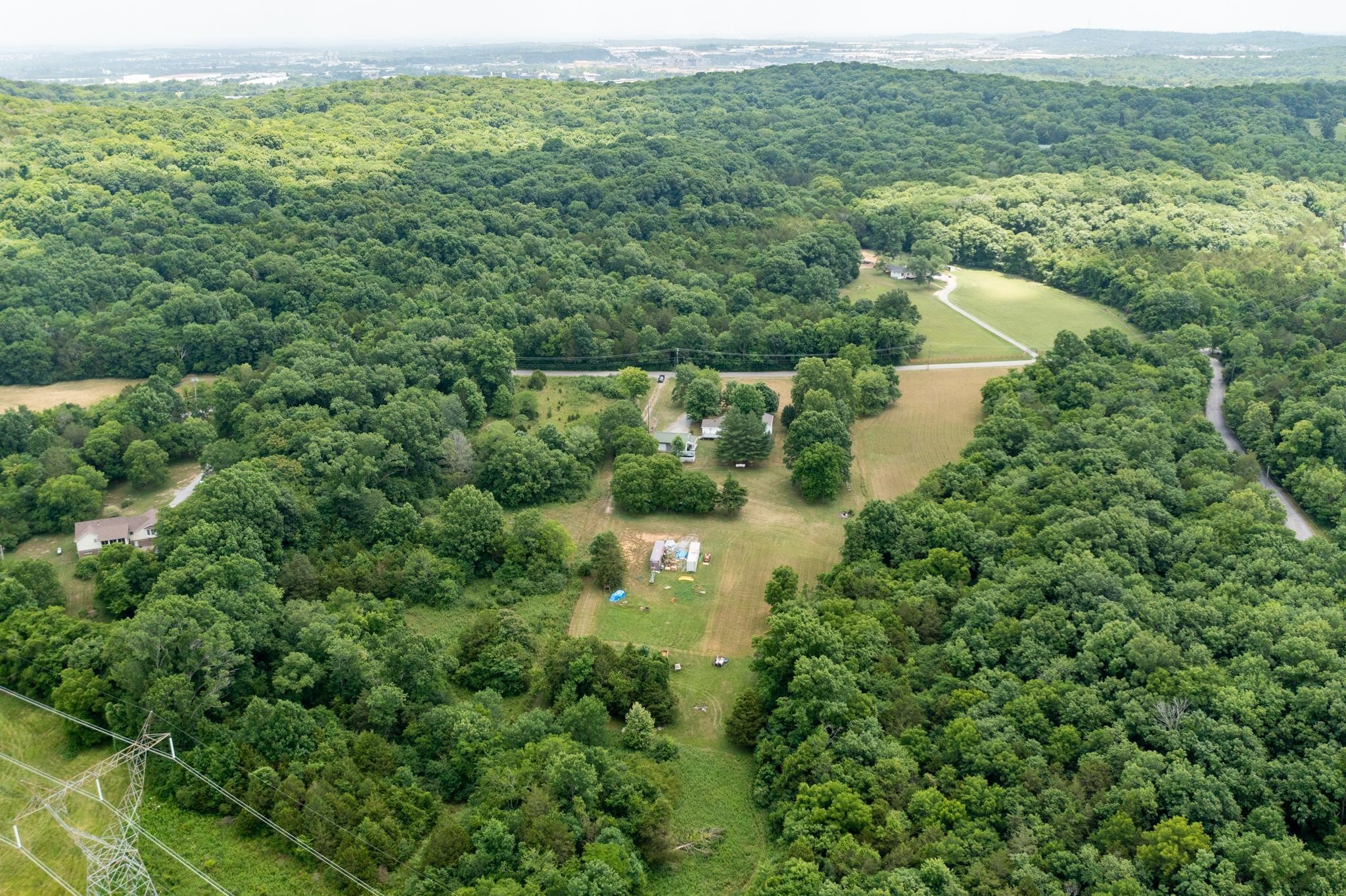 5799 Cane Ridge Road Antioch, TN 37013 - Photo 40 of 45 a view of a lake view with houses in back