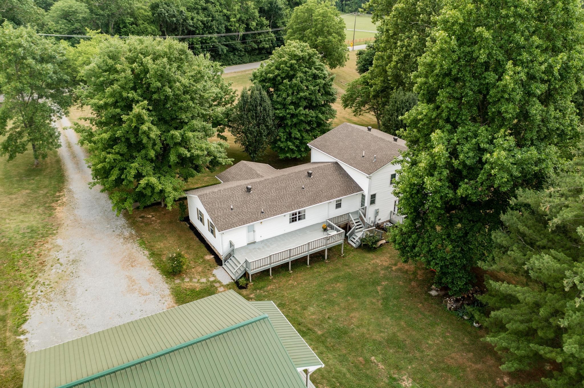 5799 Cane Ridge Road Antioch, TN 37013 - Photo 45 of 45 an aerial view of a house with swimming pool and a yard
