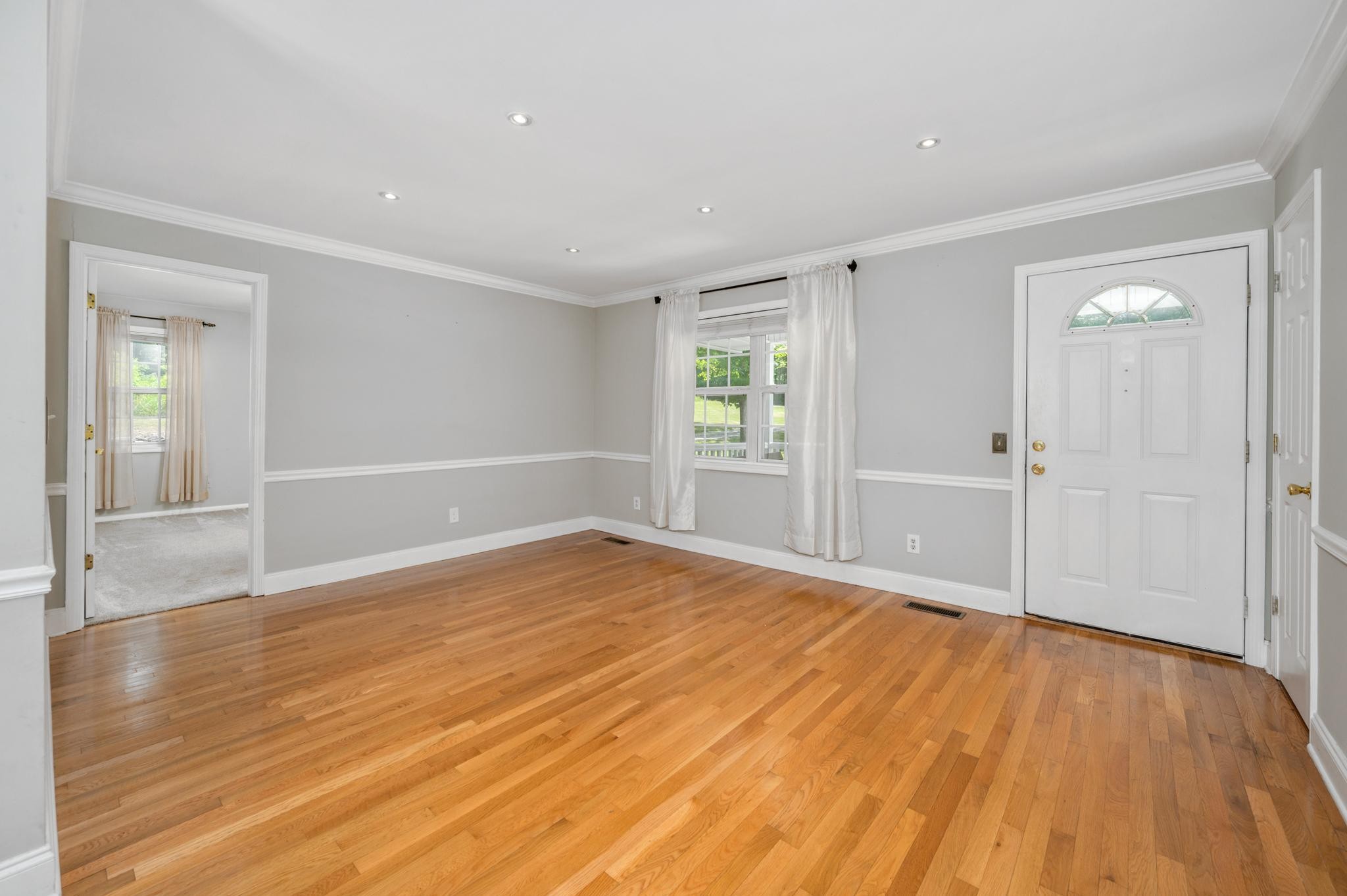 5799 Cane Ridge Road Antioch, TN 37013 - Photo 8 of 45 wooden floor in an empty room with a window