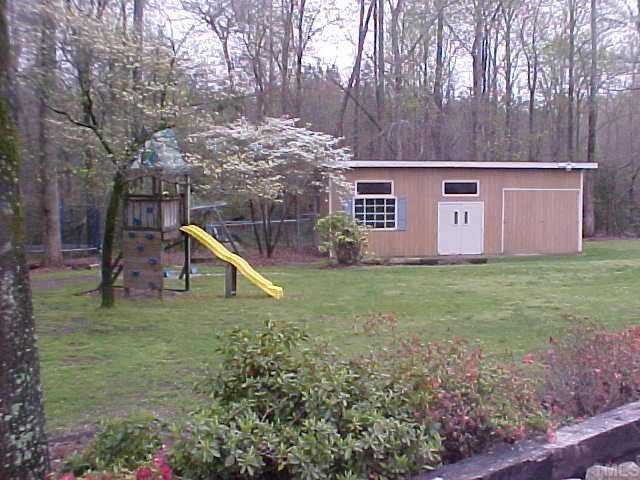 10 Turnipseed Road Wendell, NC 27591 - Photo 11 of 12 Great backyard - large workshop.