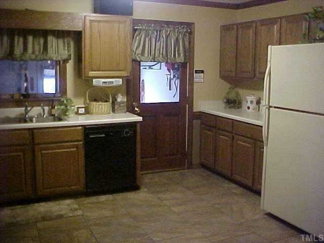 10 Turnipseed Road Wendell, NC 27591 - Photo 4 of 12 Sellers have added ceramic tile to kitchen area