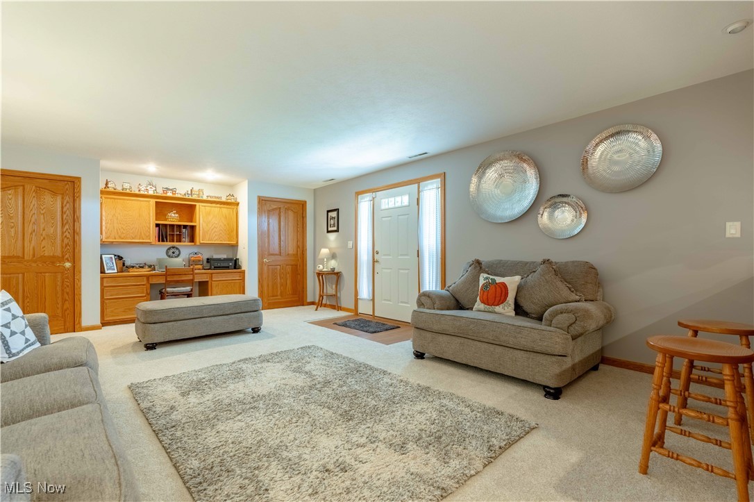 90480 Kilgore Ridge Road Scio, OH 43988 - Photo 8 of 39 Living area with light carpet and a desk