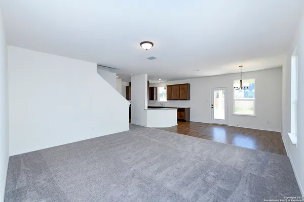 a view of a kitchen with a sink and a microwave