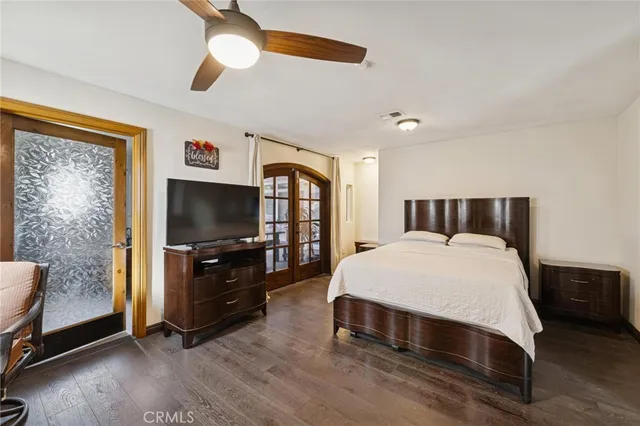 a view of a park with large trees