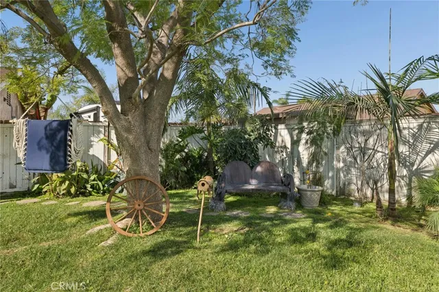 a bedroom with a bed dresser and a window