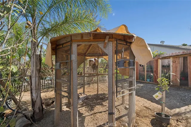 an aerial view of a residential apartment building with a yard