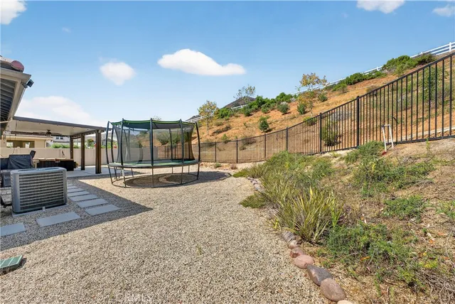 a view of a pathway with a building in the background