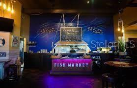 102 Riviera Dunes Way, Unit S 21 Palmetto, FL 34221 - Photo 18 of 57 a sign that is sitting in front of a building