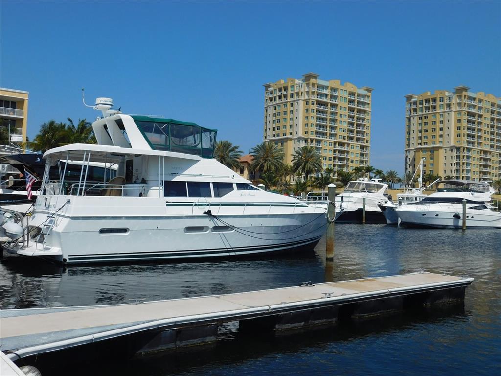 102 Riviera Dunes Way, Unit S 21 Palmetto, FL 34221 - Photo 40 of 57 a view of a swimming pool with outdoor seating