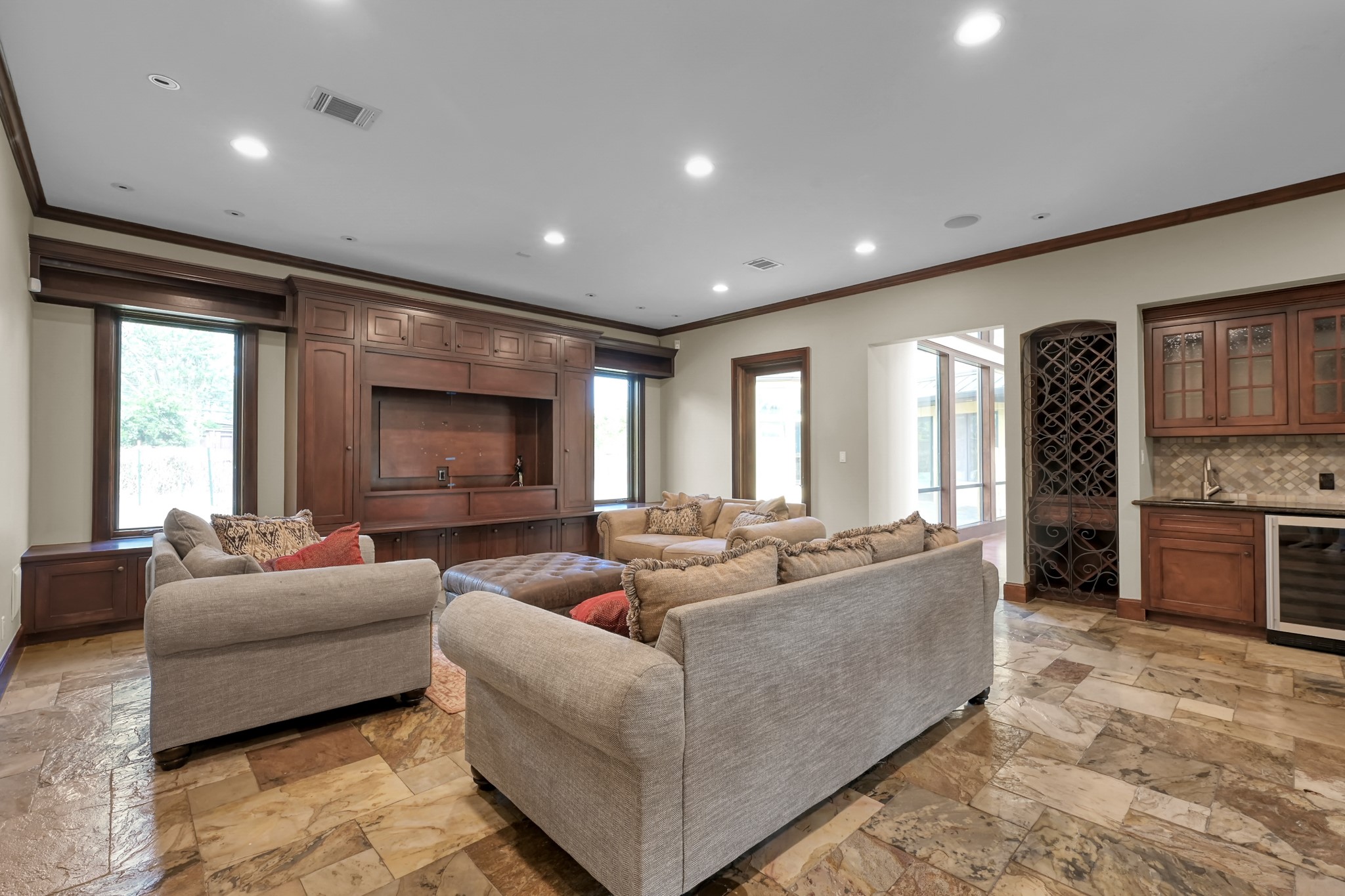 9602 Chatfield Street Houston, TX 77025 - Photo 12 of 48 a living room with fireplace furniture and a flat screen tv