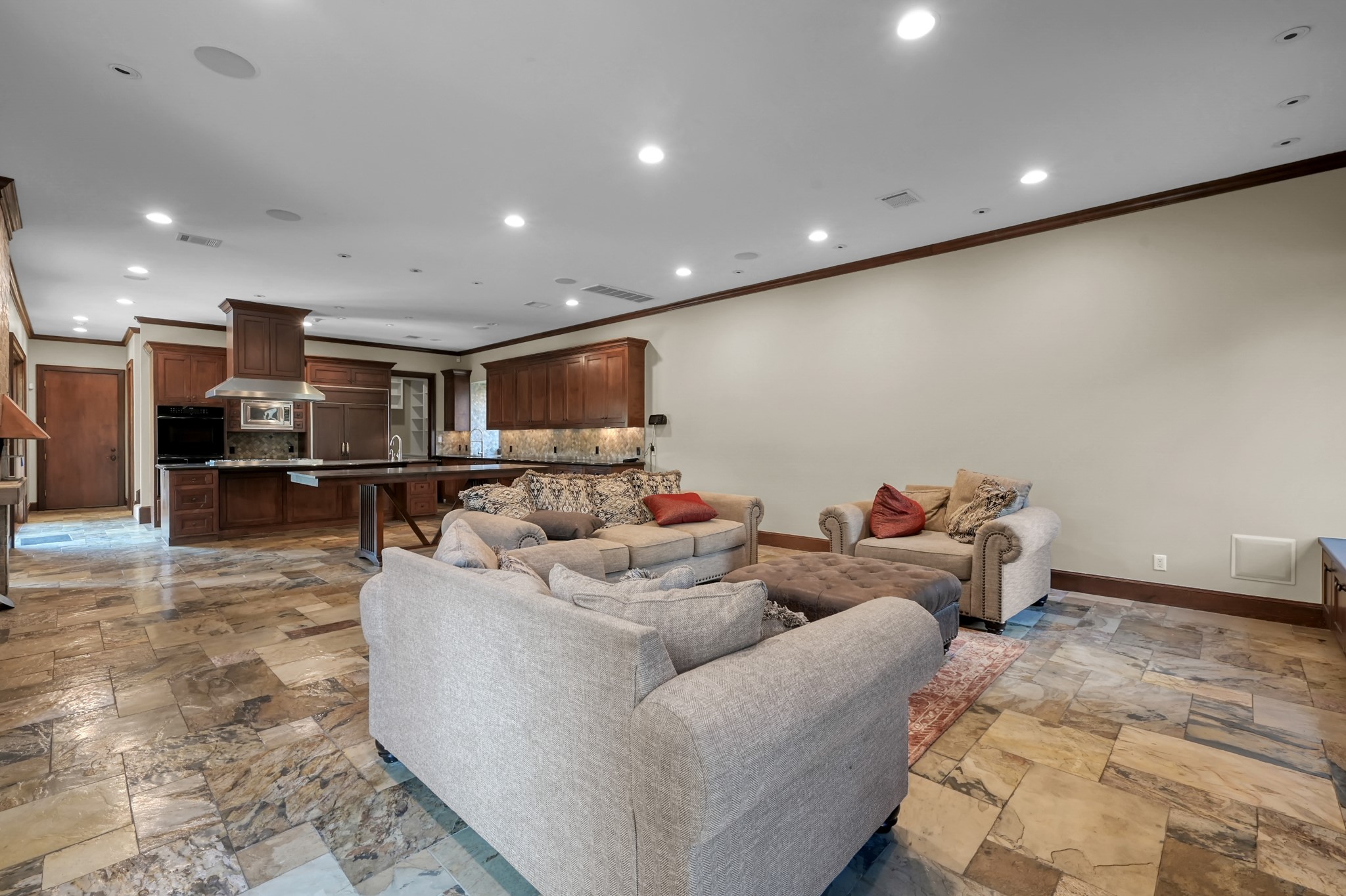 9602 Chatfield Street Houston, TX 77025 - Photo 13 of 48 a living room with furniture and a wooden floor