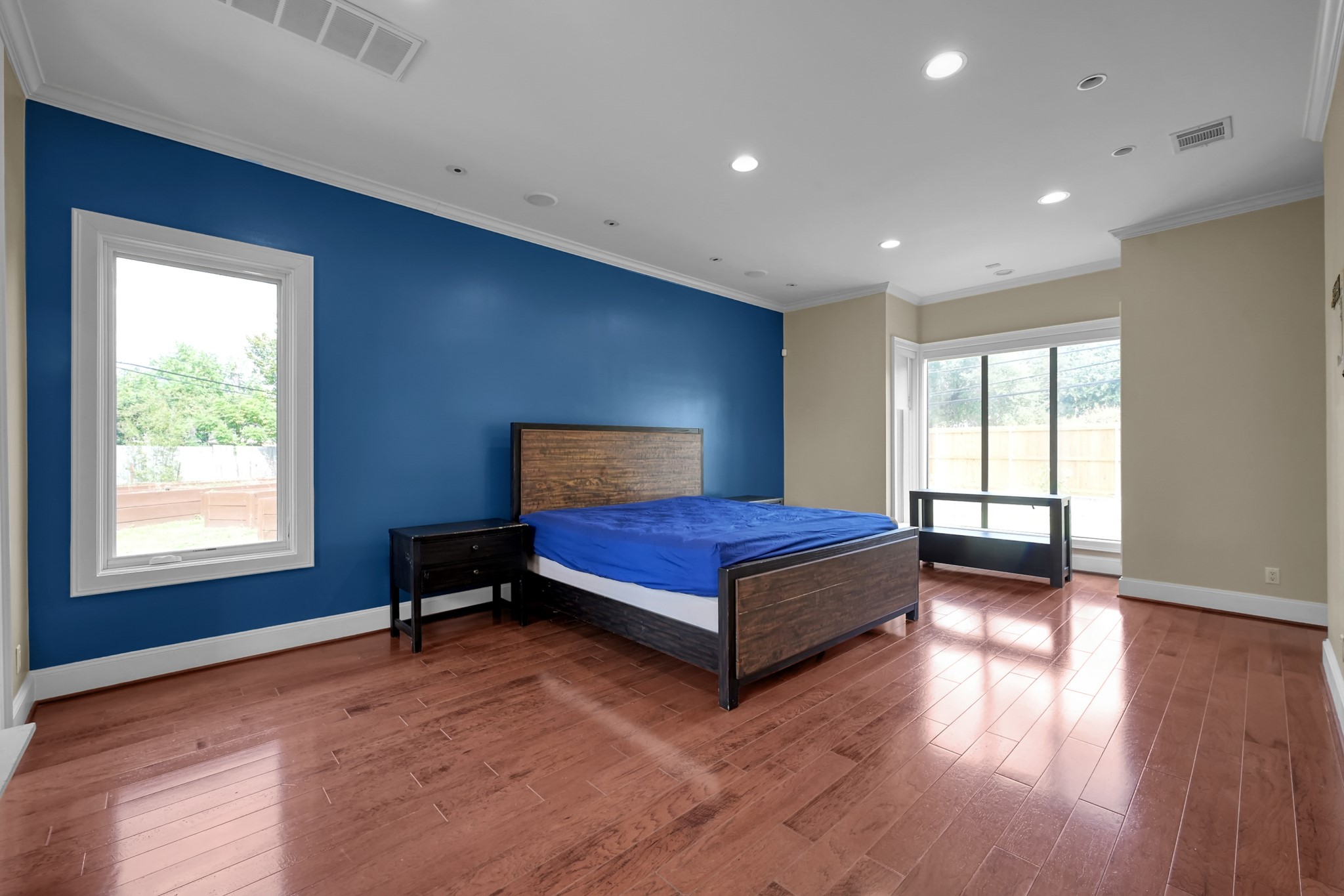 9602 Chatfield Street Houston, TX 77025 - Photo 19 of 48 a bedroom with a bed and a window