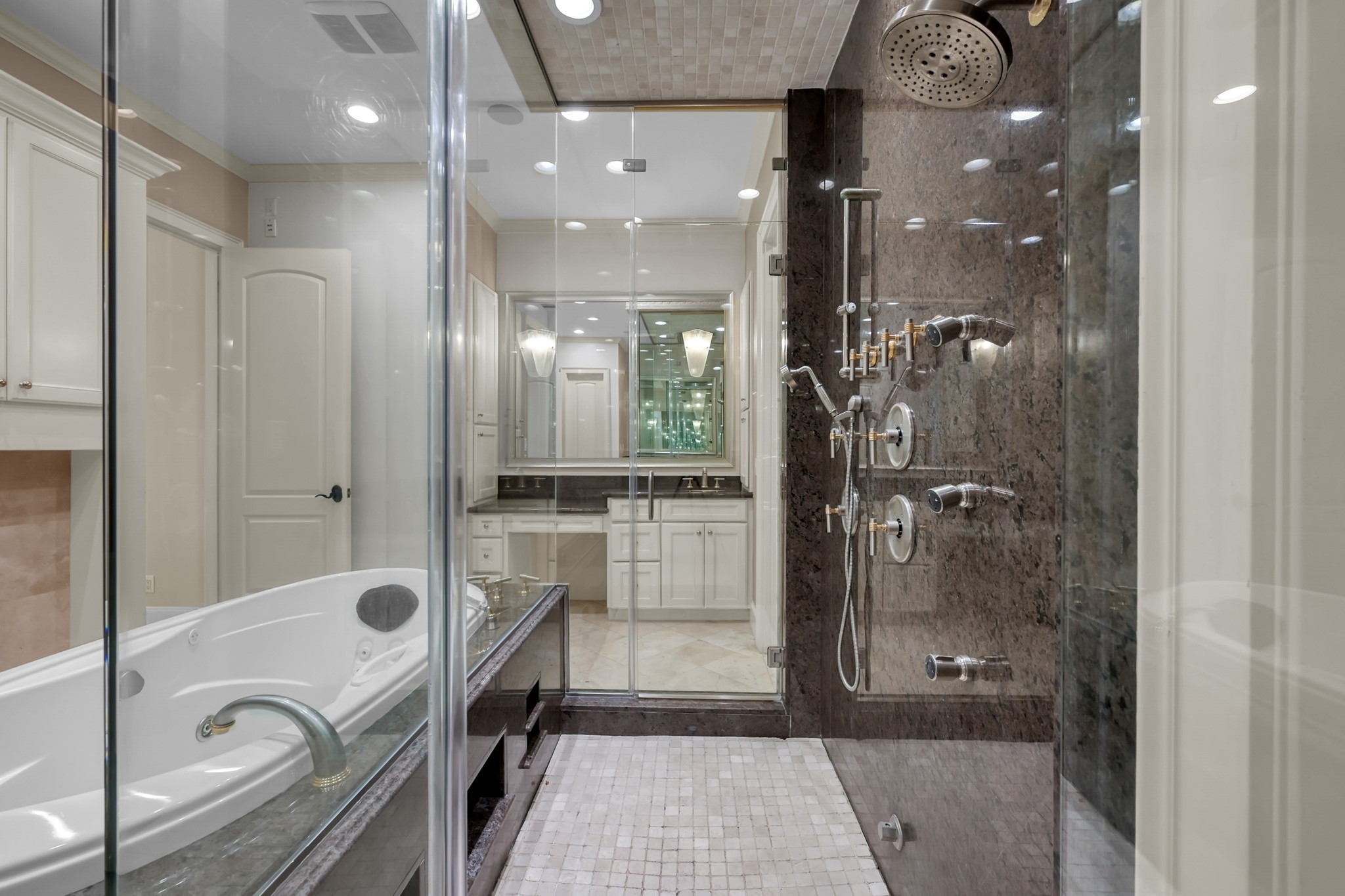 9602 Chatfield Street Houston, TX 77025 - Photo 24 of 48 a bathroom with a tub shower and sink